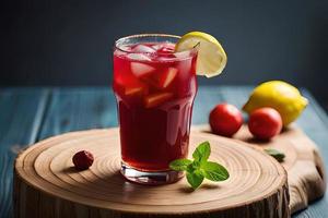 Refreshing Fruity Summer Drink on Table with Lemon and Mint photo