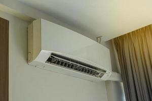 air conditioner Wall type is an electrical appliance used to adjust the temperature in the room that needs to be cooled down and stable. Easy to install and maintain. There are many functions to use. photo