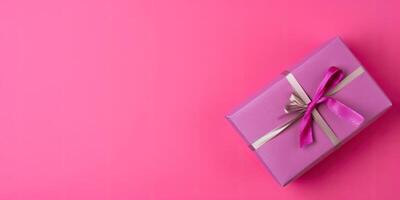 Colorful wrapped gift on a solid color background, with copy space, photo