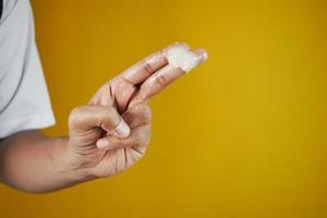 Close up of man hand using petroleum jelly photo