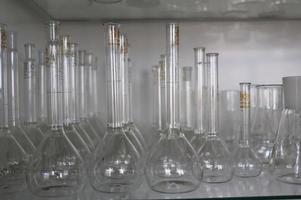 photo closeup photo set of glass flasks in laboratory