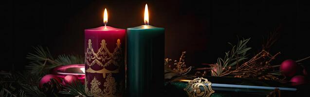 Burning candle and Christmas decoration over snow and wooden background. . photo