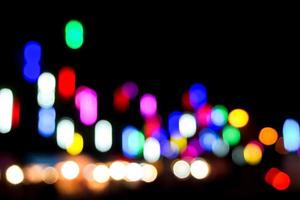 Blurred and bokeh with long short view reflection colorful lighting of city and night life. By the way to look like the sound graphic equalizer photo