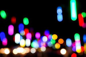 Blurred and bokeh with long short view reflection colorful lighting of city and night life. By the way to look like the sound graphic equalizer photo