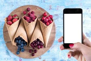 Fresh berry fruits in the cone photo