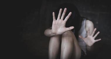 victim woman in emotional stress, rape and sexual abuse, Human trafficking, Stop abusing violence. photo