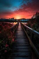 Wooden plank walkway leading to a beautiful sunset on the lake. . photo