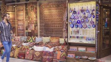 Historical woven rugs. Shops with woven rugs in the historical covered bazaar in Istanbul. video