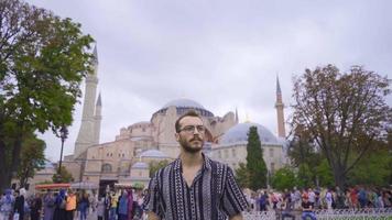 Tourist visiting Istanbul. Tourist man visiting historical mosques. video