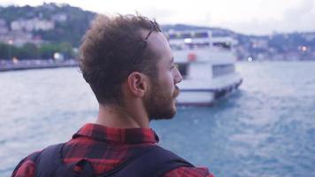 Tourist watching the city from the ferry. Tourists advancing on the ferry on the sea in the Bosphorus watch the city and its surroundings. Happy. video