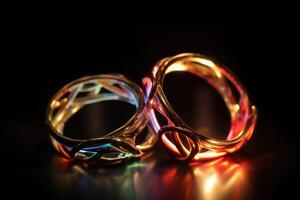 Two wedding rings made of light and energy created with technology. photo