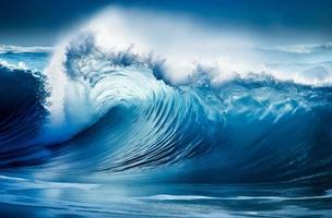 Blue ocean wave. Big waves breaking on an reef along photo