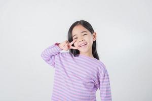 Image of Asian child posing on white  background photo