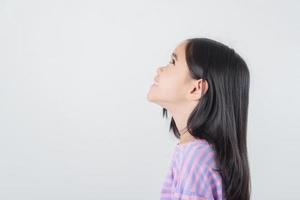 Image of Asian child posing on white  background photo