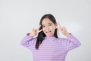 Image of Asian child posing on white  background photo