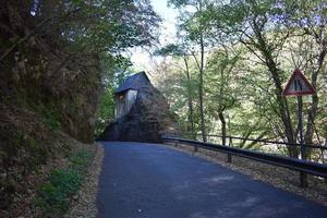 Road Between Cliffs With a Chapel photo