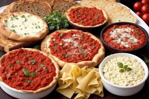 Italian cuisine. Assorted italian appetizers on a plate. Spaghetti with meatballs, tomato sauce and basil. photo