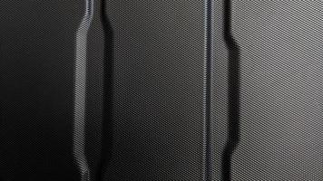 Abstract carbon fiber fabric, with black carbon fiber texture. photo