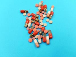 Assorted pharmaceutical medicine pills, tablets and capsules photo