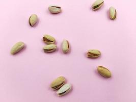 Roasted salted pistachio nuts in nutshell photo