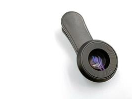 External macro lens, mobile phone clip. On white background. Accessory for mobile photography photo