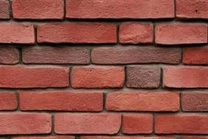 Old grunge brick wall background photo