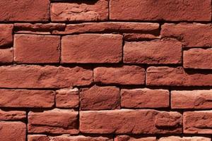 Very old and weathered red brick wall texture background photo