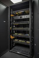 Ethernet cables and path panel in rack cabinet. photo