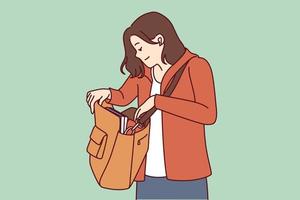 Woman looks into large bag hanging on shoulder in search of wallet or phone lost in handbag. Tourist girl with handbag dressed in casual clothes is trying to find lost or stolen personal items. vector