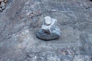 abstraction, stones on stones in the wild in the mountains photo