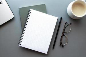 Mockup notebook on desktop flat lay photo