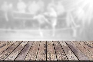Empty wooden table platform with blur thai boxing background photo