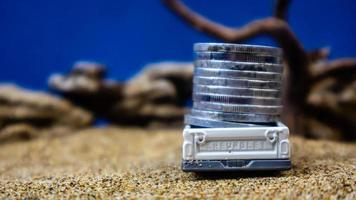 minahasa, Indonesia  January 2023, Toy car carrying coins photo