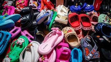 pile of footwear in a footwear store photo