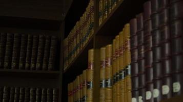 Old books row background. Old fashioned books closeup. photo