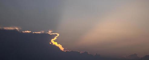 Blue sky and fluffy clouds. Beautiful cloudscape background. Sunlight on the clouds. photo