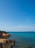 Landscape summer panorama view front nature seen along the mountains rock coast and sea ocean, look blue sky, horizon wind cool breeze, comfortable during the travel day, relax, Rayong, Thailand photo