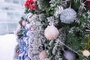 Christmas tree and decorations outdoor in snow winter photo