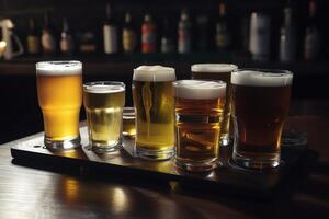 Assorted beer on pub bar table. photo