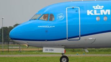AMSTERDAM, THE NETHERLANDS JULY 25, 2017 - KLM Cityhopper Fokker 70 PH KZU Anthony Fokker Livery taxiing before departure at runway 36L Polderbaan. Shiphol Airport, Amsterdam, Holland video