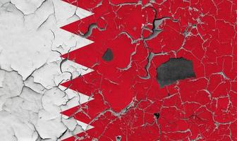 3D Flag of Bahrain on stone wall photo