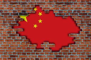 3D Flag of China behind the broken old stone wall background. photo