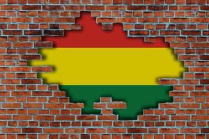 3D Flag of Bolivia behind the broken old stone wall background. photo