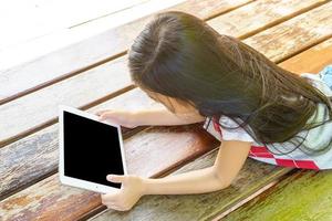 Children playing tablet photo