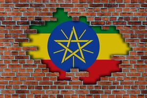 3D Flag of Ethiopia behind the broken old stone wall background. photo