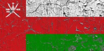 3D Flag of Oman on an old stone wall background. photo