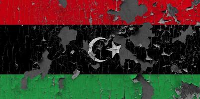 3D Flag of Libya on stone wall photo