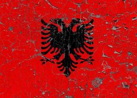 3D Flag of Albania on stone wall photo