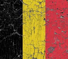3D Flag of Belgium on stone wall photo