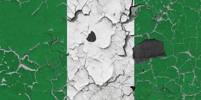 3D Flag of Nigeria on an old stone wall background. photo